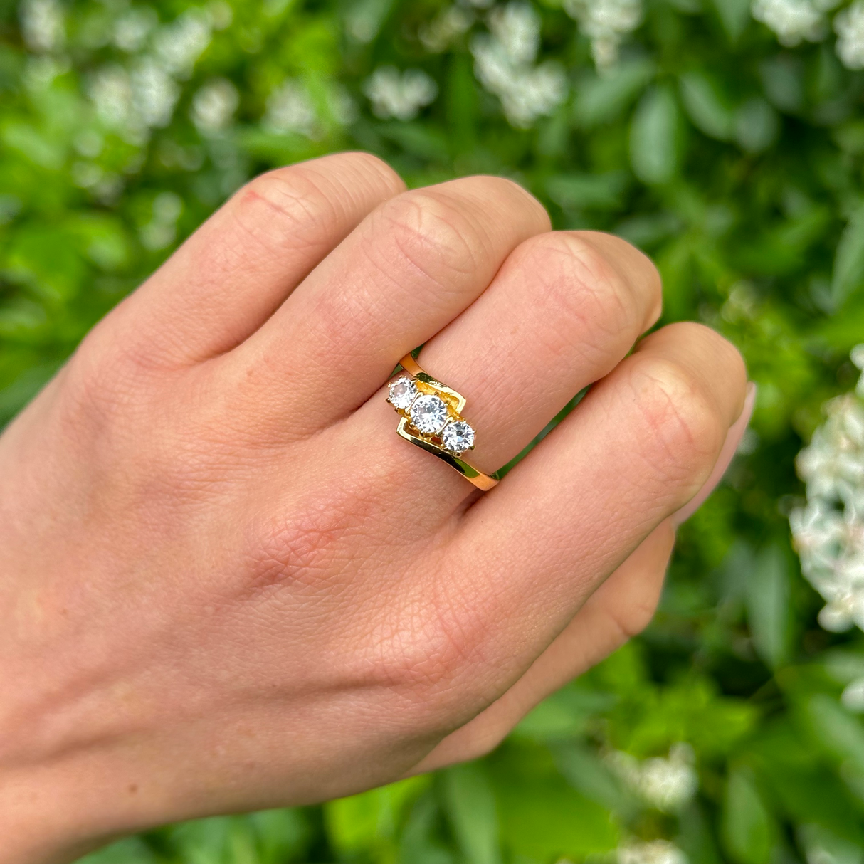 Vintage, 1967 Three-Stone White Sapphire Engagement Ring, 18ct Yellow Gold worn on hand.