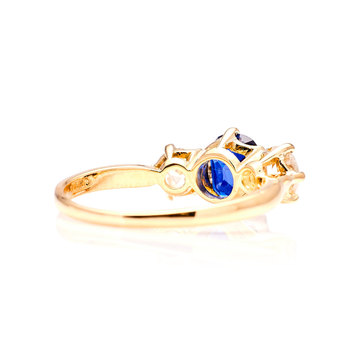 Vintage, 1980s sapphire and diamond three-stone ring back view