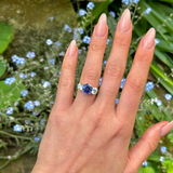 Vintage, 4ct Sapphire and Diamond Three-Stone Engagement Ring worn on hand.