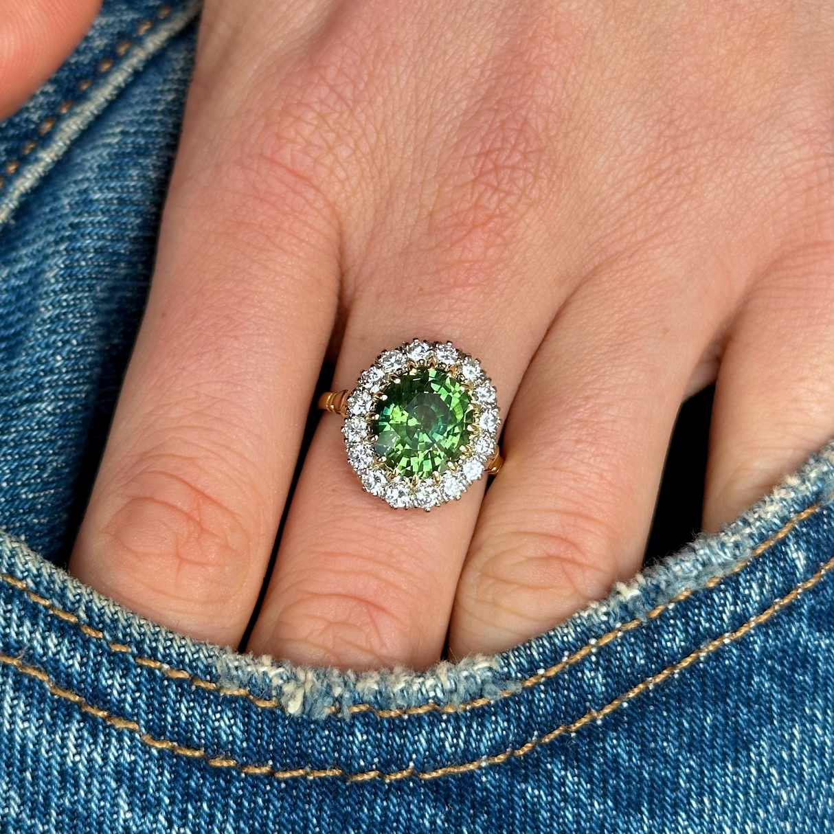 Vintage, 5ct Green Sapphire and Diamond Cluster Ring, 18ct Yellow Gold worn on hand in pocket of jeans.