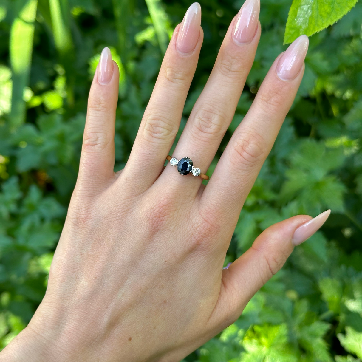 Vintage, Art Deco Sapphire and Diamond Three-Stone Ring, 18ct Yellow Gold and Platinum worn on hand.