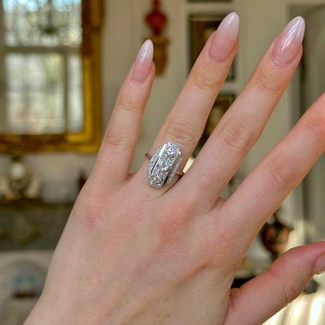 Vintage, Art Deco Three-Stone Diamond Panel Ring, Platinum worn on hand.