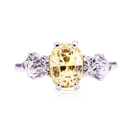 yellow sapphire and diamond three stone engagement ring, front view. 