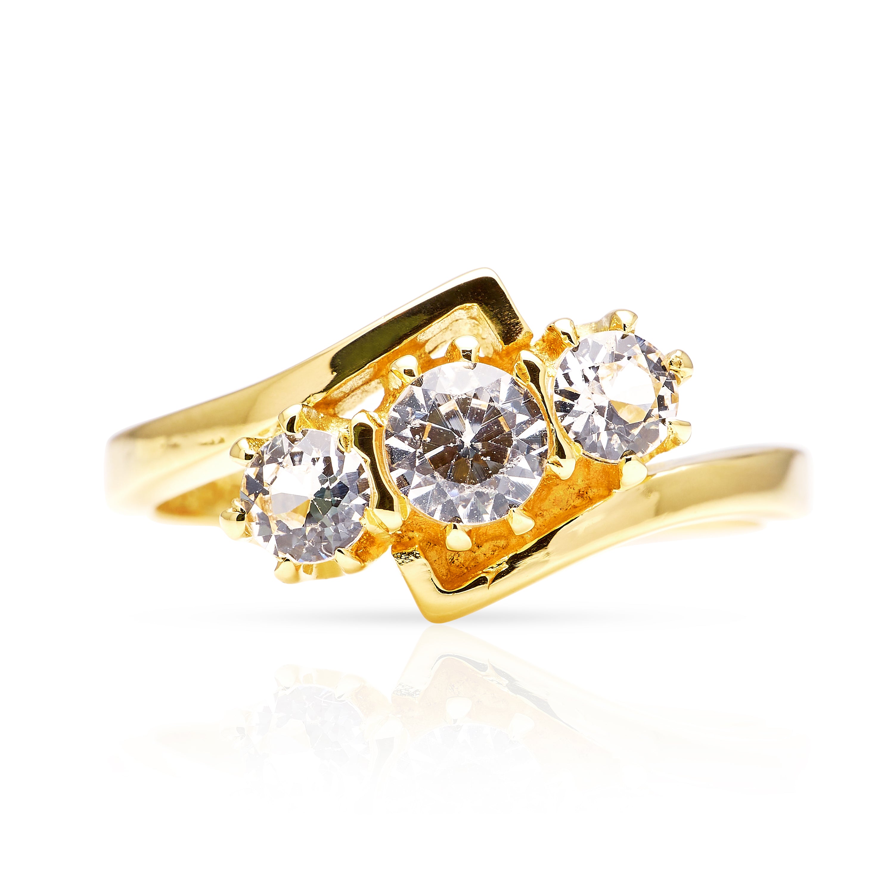 Vintage, 1967 three-stone white sapphire engagement ring