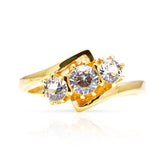 Vintage, 1967 three-stone white sapphire engagement ring, 18ct yellow gold