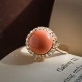 Antique angel skin coral cabochon with rose cut diamond cluster ring