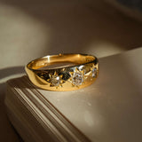 Antique Edwardian gypsy ring with old mine cut diamonds and star settings