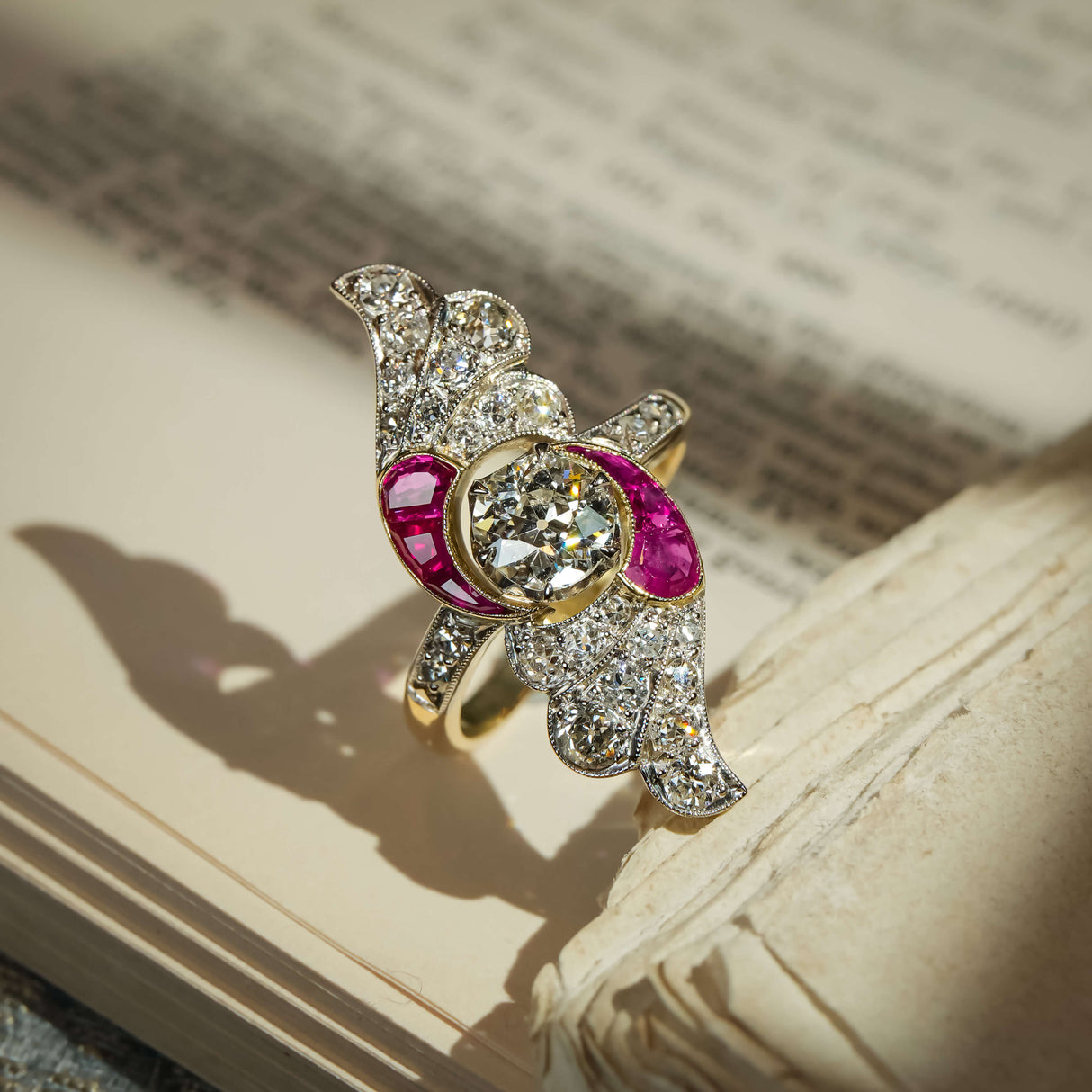 Antique Art Nouveau diamond and ruby cocktail ring with central diamond and ruby details
