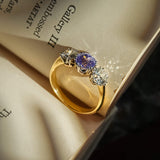 Edwardian sapphire center stone with diamond side stones engagement ring