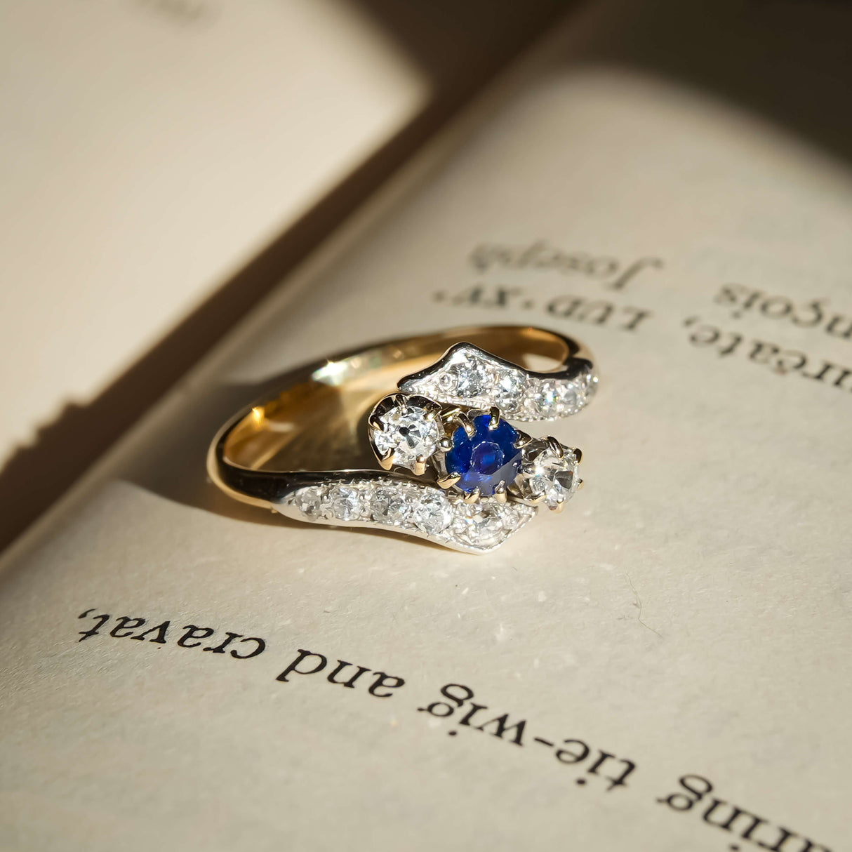 antique edwardian sapphire diamond twist ring with yellow gold setting