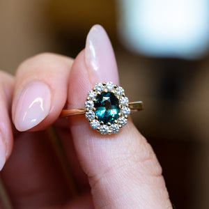 Rare juniper-green and teal sapphire and diamond cluster engagement ring