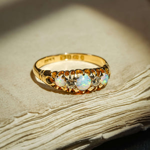 Antique late Victorian opal and diamond five stone ring with graduating opals and diamond accents