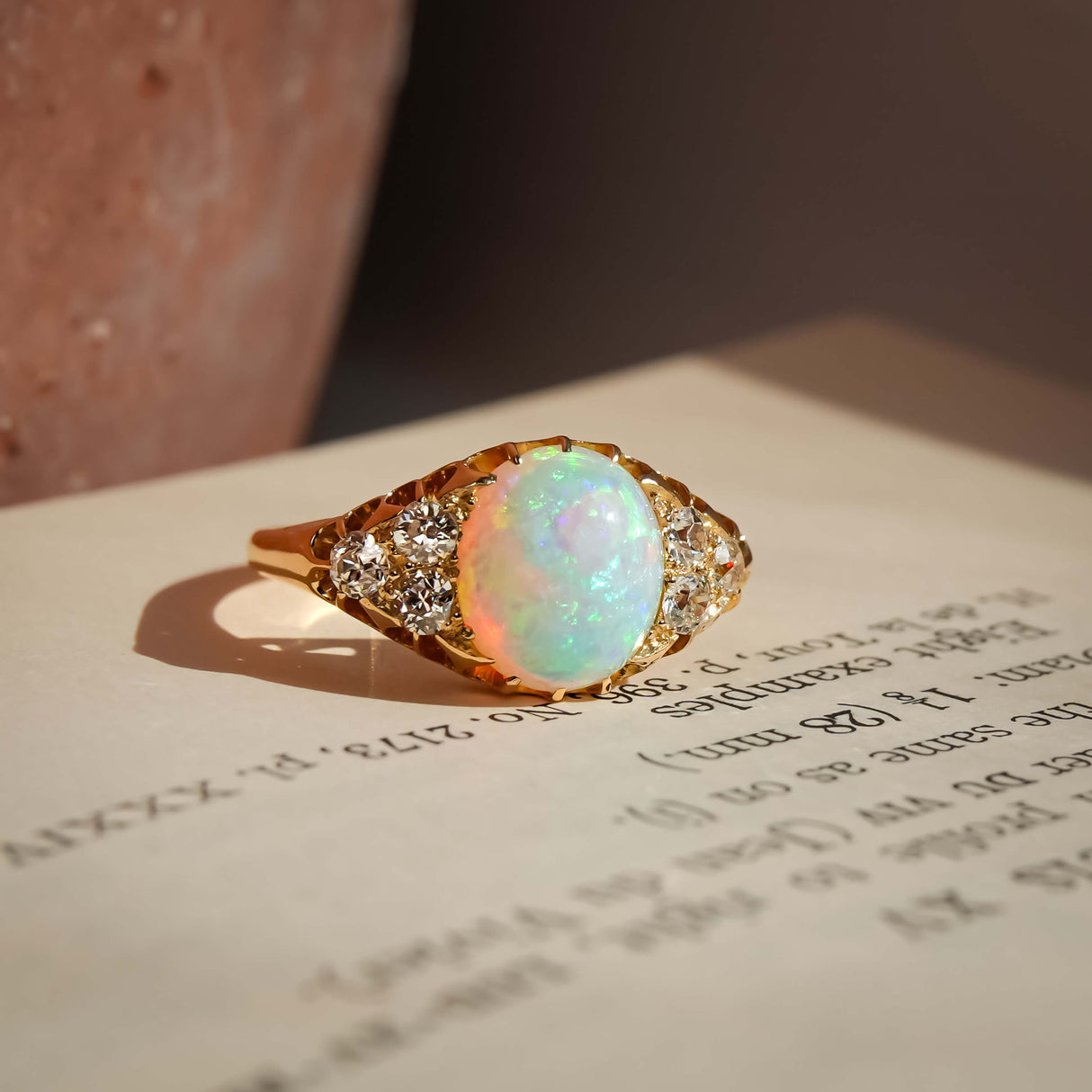 antique opal diamond cabochon ring with victorian style in yellow gold