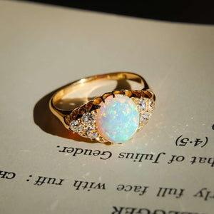 antique cabochon opal diamond ring with victorian design in yellow gold