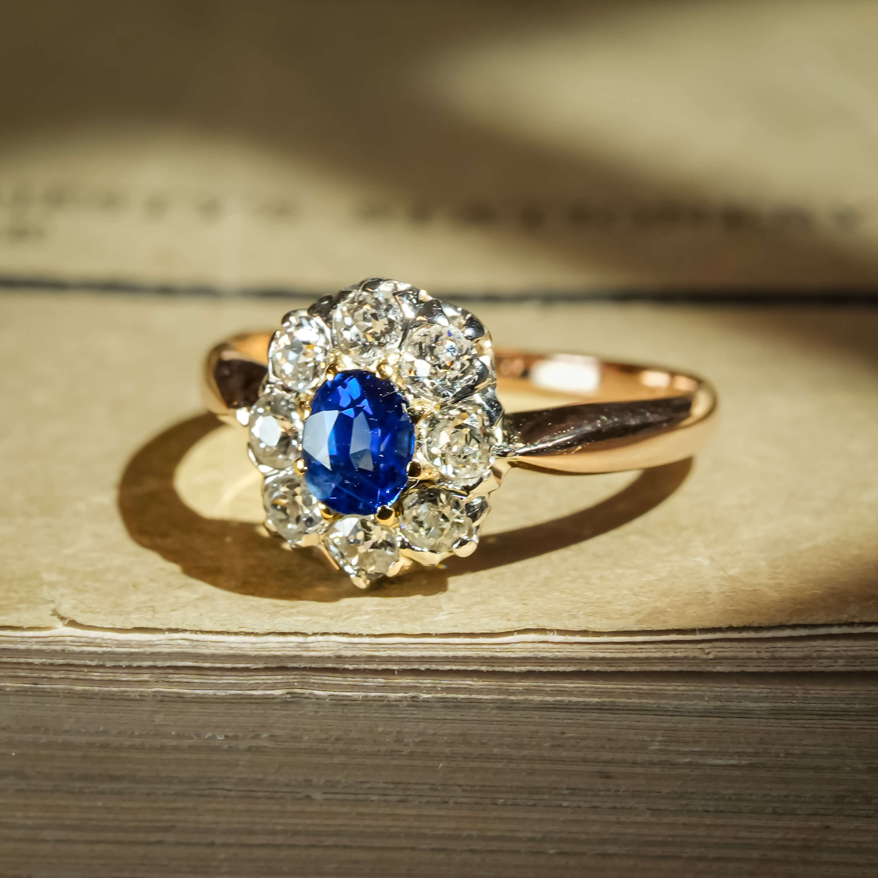Antique, Belle Èpoque sapphire and diamond cluster engagement ring