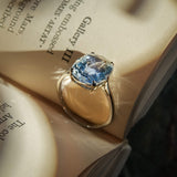 Antique 1920s sapphire solitaire ring with cushion cut blue gemstone