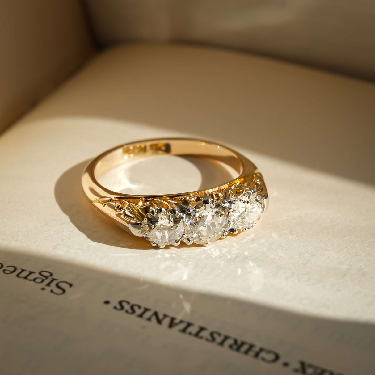antique victorian diamond three stone engagement ring in yellow gold