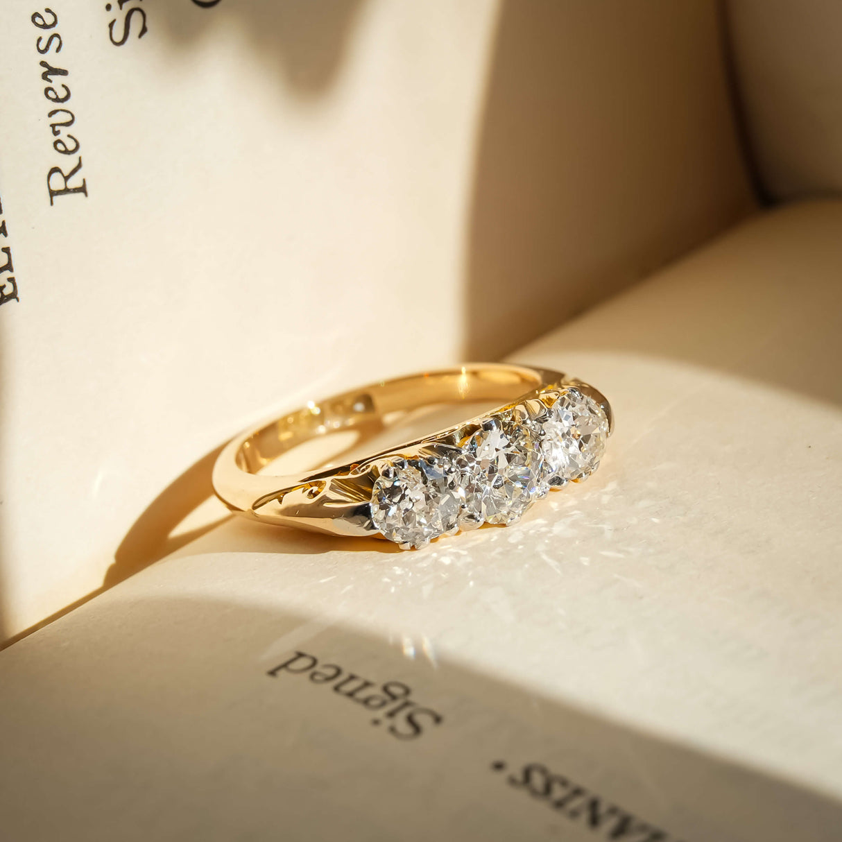 antique victorian diamond three stone ring with yellow gold setting