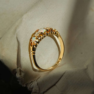 Antique late Victorian opal and diamond five stone ring with opals and diamond accents