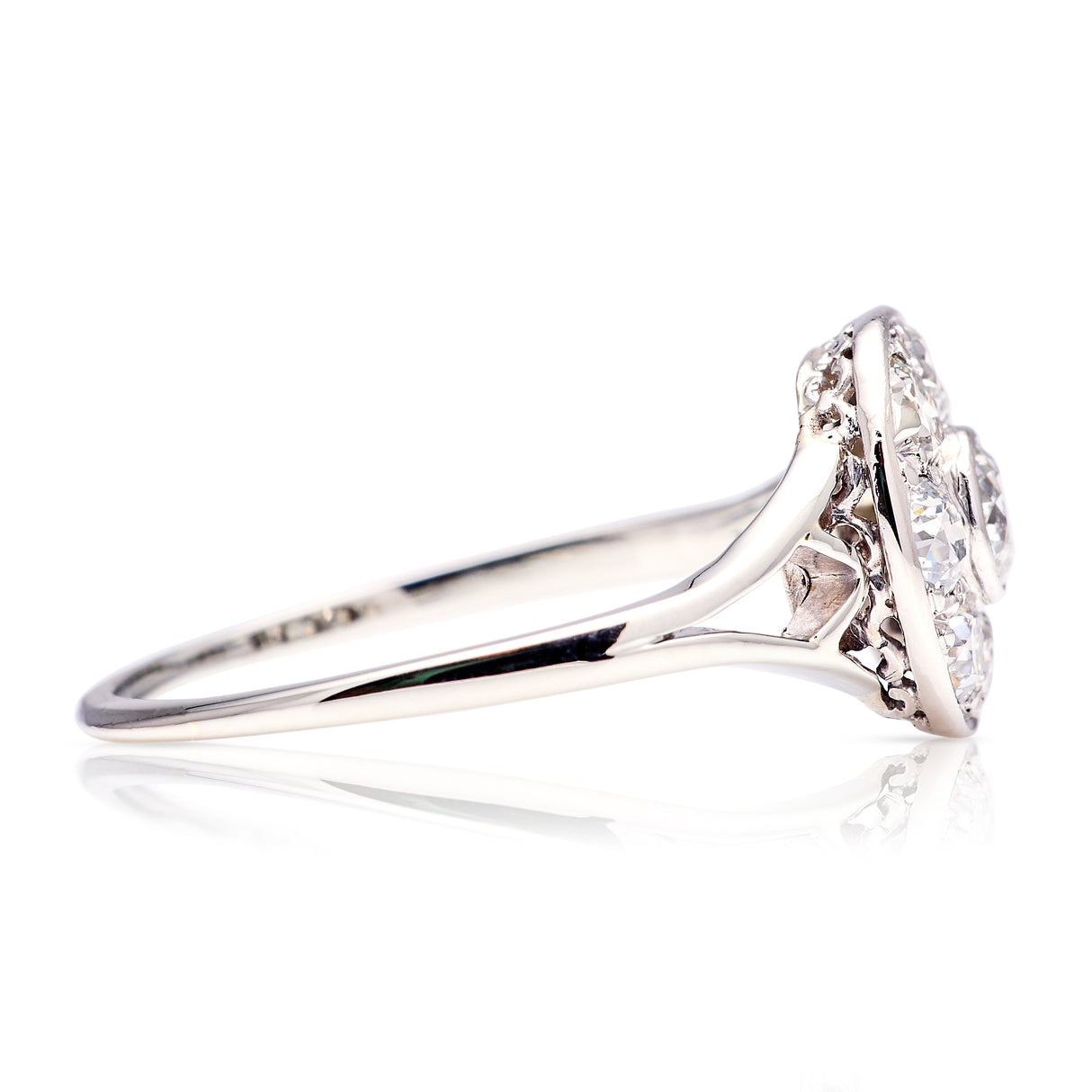 Vintage, Art Deco diamond cluster target engagement ring