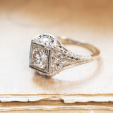 Antique Art Deco diamond cluster ring with old-cut diamond.