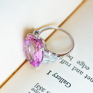 Art Deco pink topaz and diamond cocktail ring with oval pink topaz and diamond set shoulders.