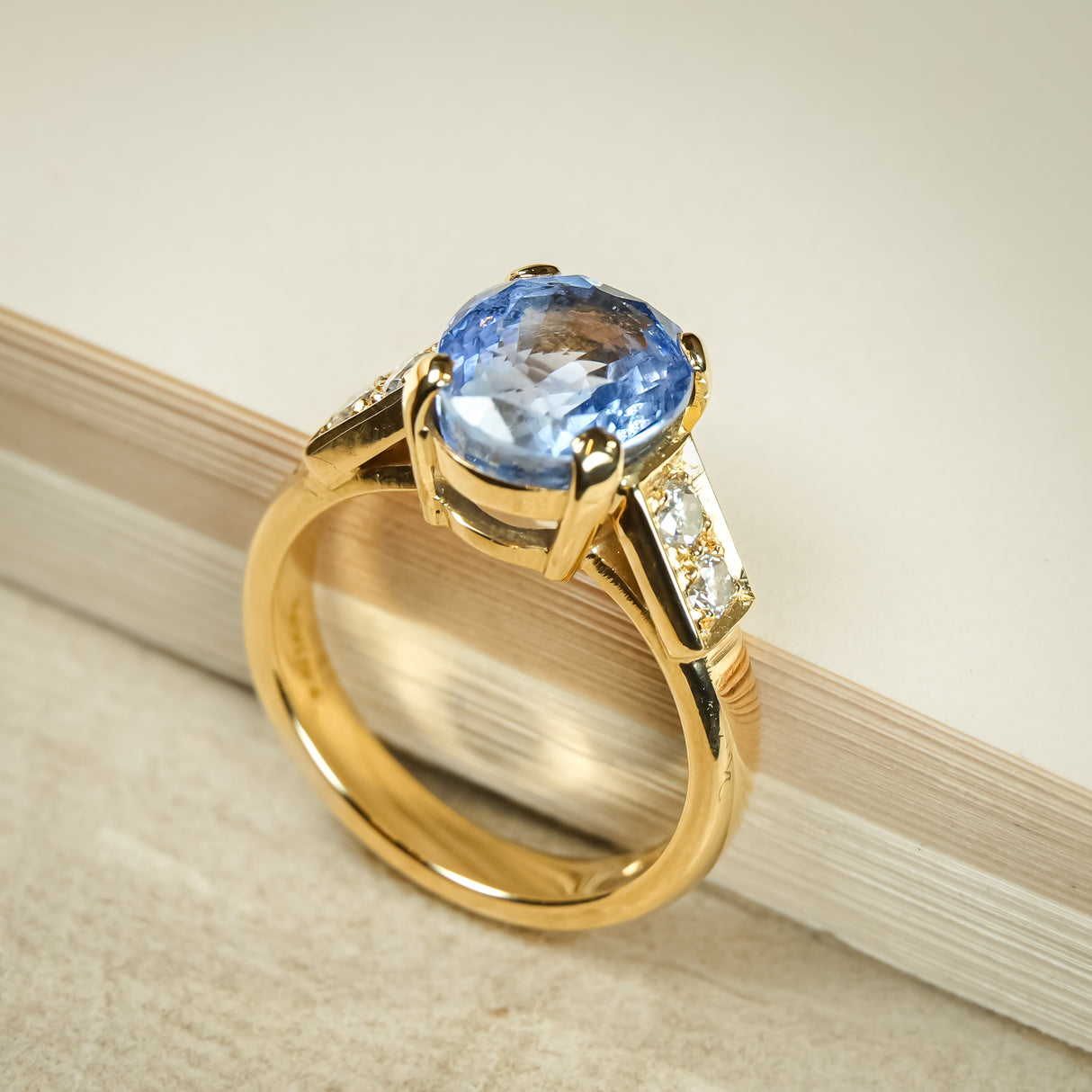Blue sapphire and diamond engagement ring in vintage 1990s style