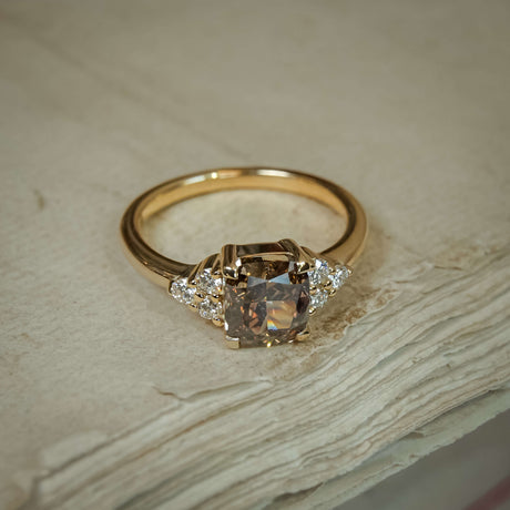 Brown diamond trefoil cluster engagement ring in yellow gold with side diamonds