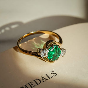 Edwardian emerald and diamond three stone ring in yellow gold band
