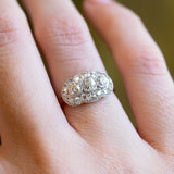 Old cut diamond cluster ring close detail showing layered diamond arrangement.