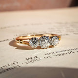 edwardian old cut diamond three stone ring with antique design in yellow gold