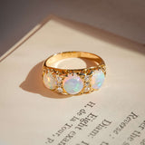edwardian opal three stone diamond ring with antique design in yellow gold