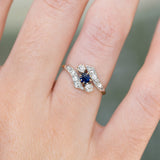 Edwardian sapphire and diamond twist ring with curved band detail