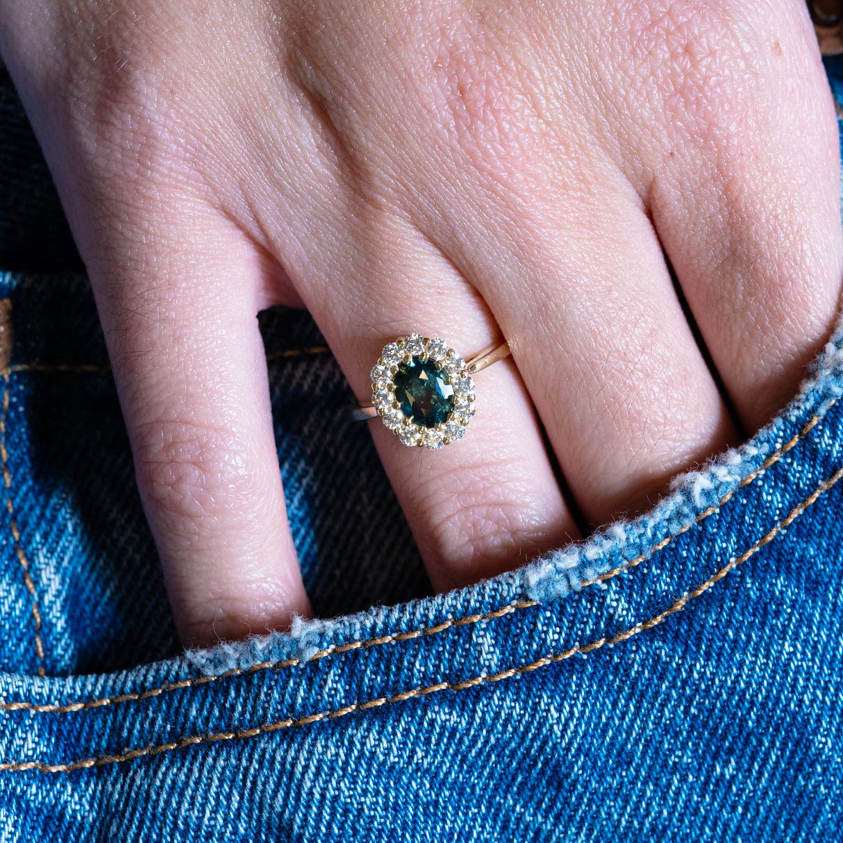 Rare juniper-green and teal sapphire and diamond cluster engagement ring