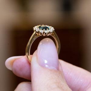 Rare juniper-green and teal sapphire and diamond cluster engagement ring