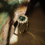 Green sapphire and diamond cluster ring with detailed gold setting