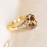 Antique-inspired hazelnut-brown diamond engagement ring with rose-cut diamond accents and yellow gold band.
