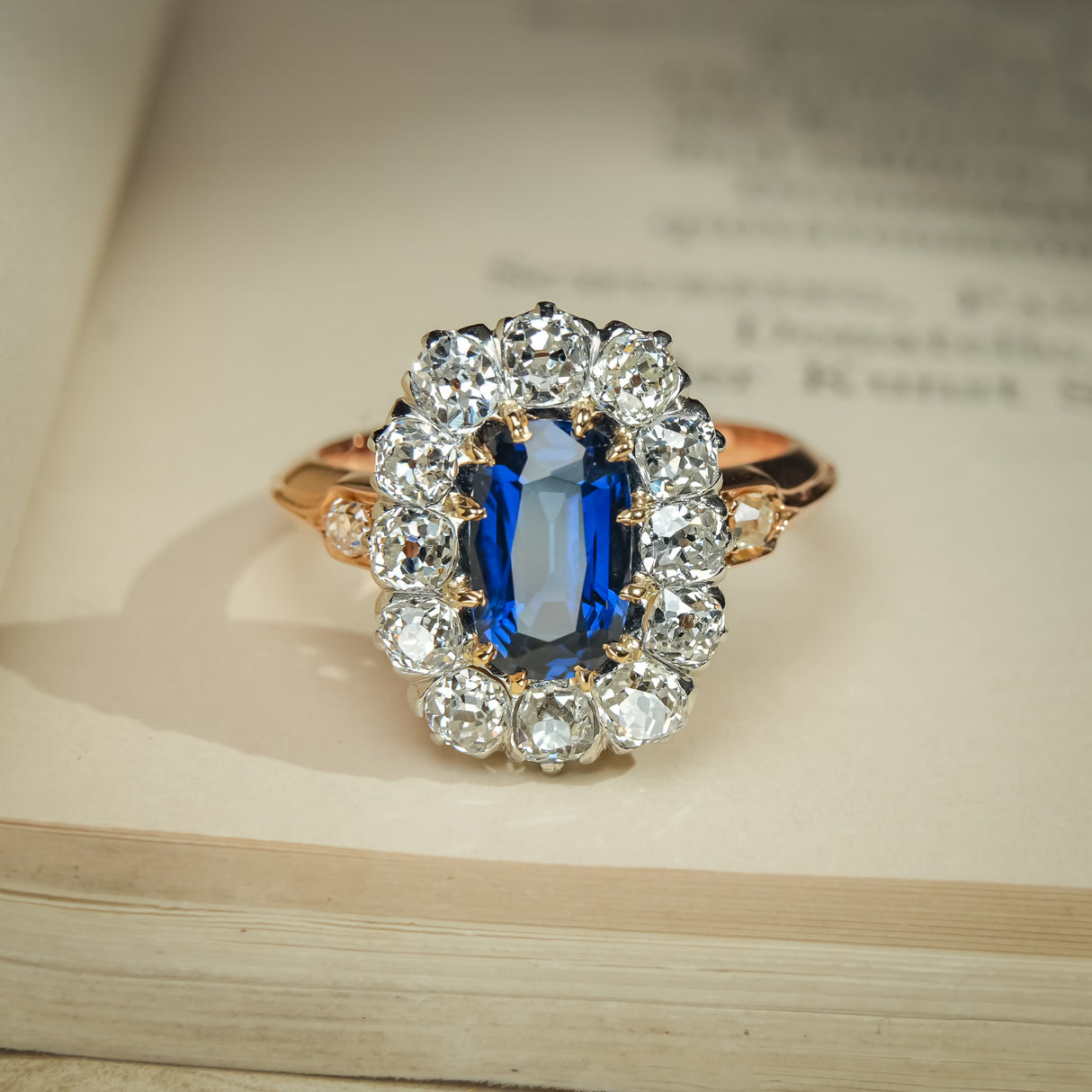 Jugendstil antique blue sapphire engagement ring with diamond cluster