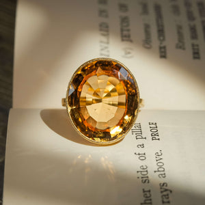 19th century orange topaz solitaire ring with oval marmalade orange gemstone