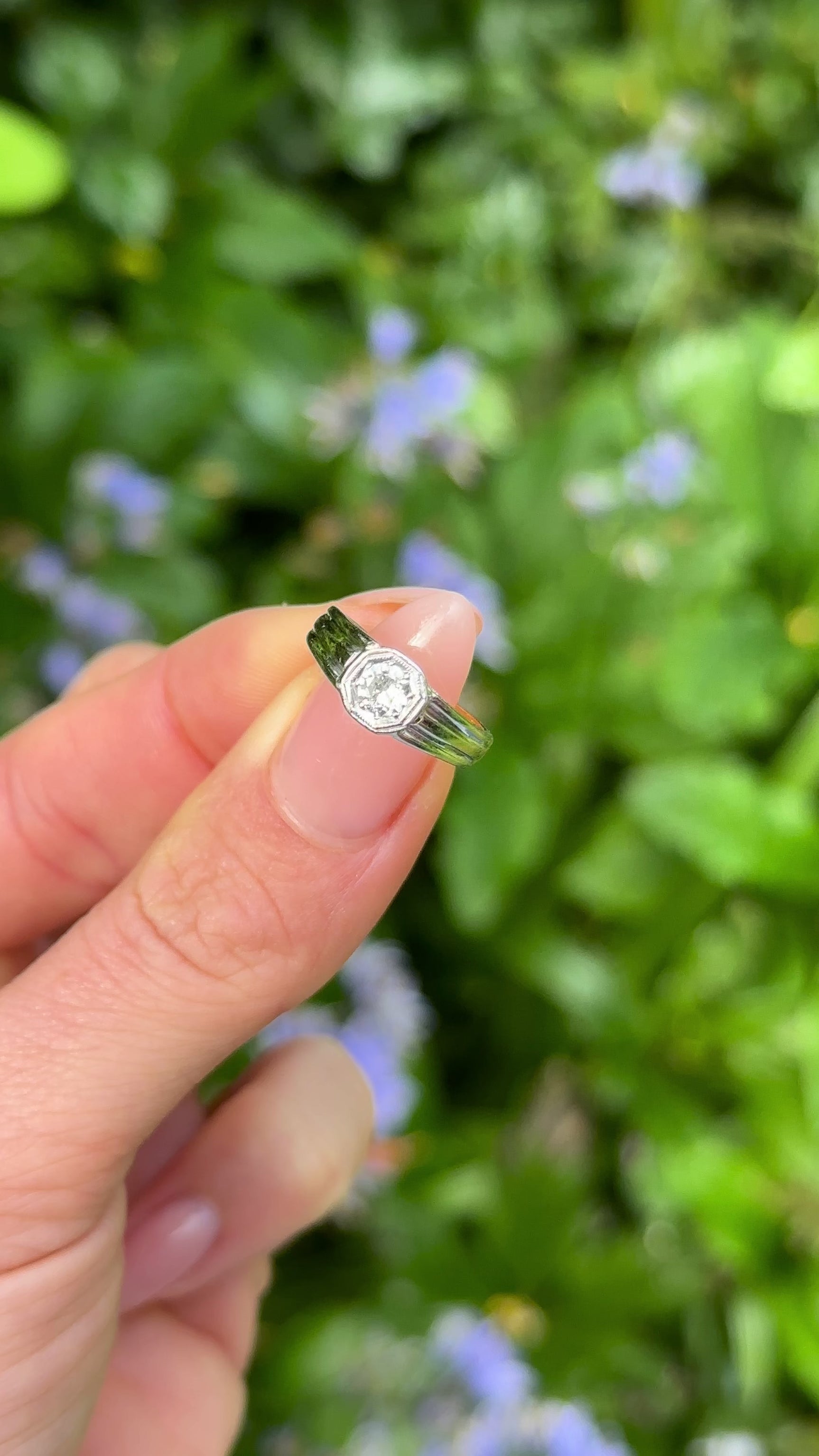 Vintage, 1930s Diamond Engagement Ring, 18ct Yellow Gold and Platinum held in fingers.