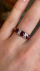 Antique, Victorian ruby and diamond three-stone ring worn on hand and moved backwards 