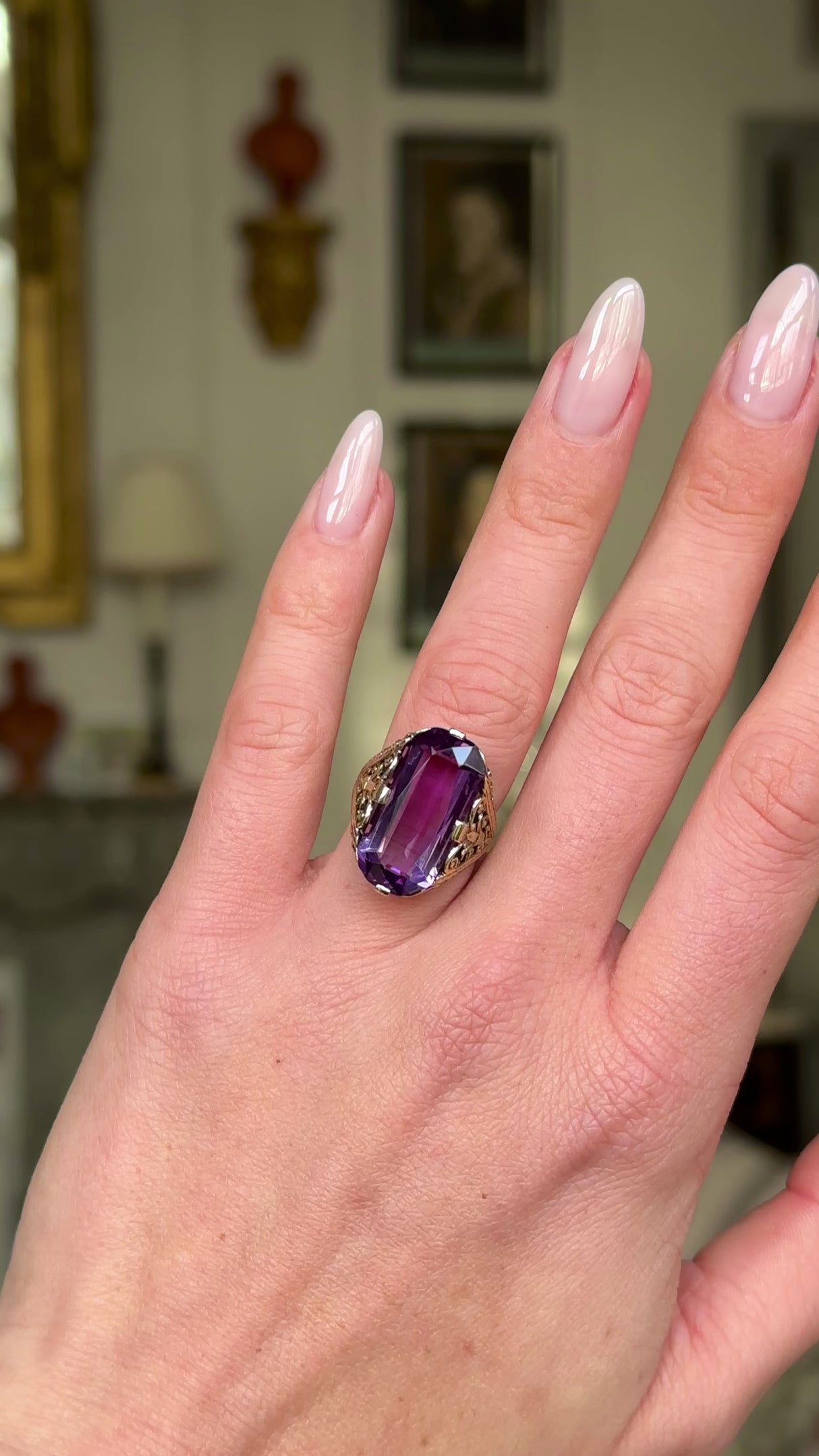 Victorian amethyst and 14ct yellow gold ring worn on hand and moved around to give perspective.