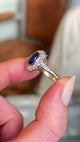 Vintage, royal blue sapphire and diamond cluster engagement ring
