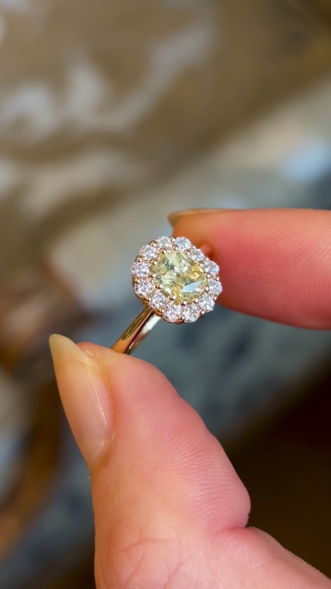 Yellow sapphire and diamond cluster engagement ring