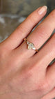 Pear-cut diamond three-stone engagement ring