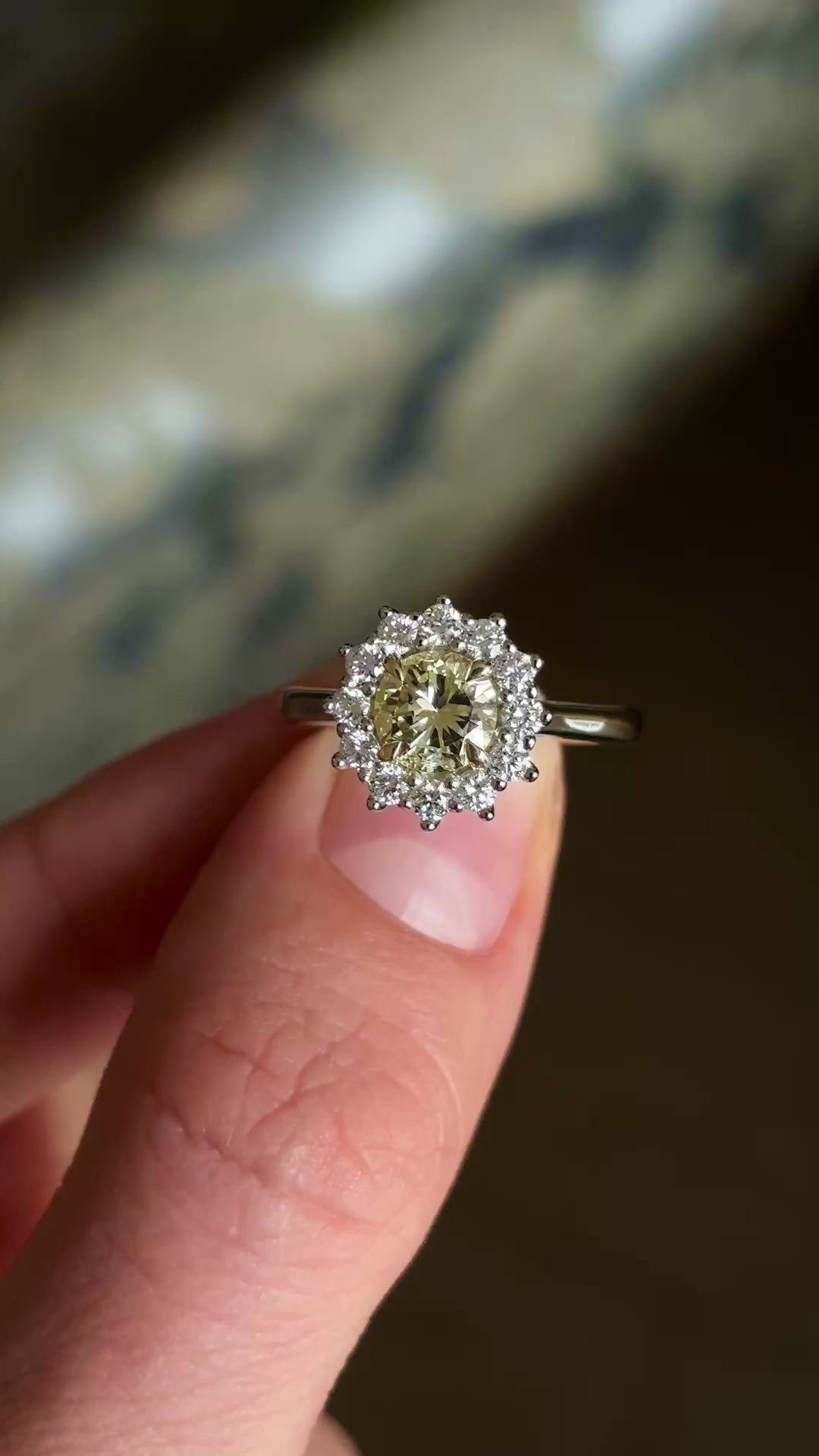Tinted yellow 1.01ct diamond cluster engagement ring