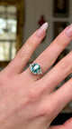 Vintage, Art Deco Aquamarine and Diamond Ring, 18ct White Gold worn on hand and rotated to give perspective.