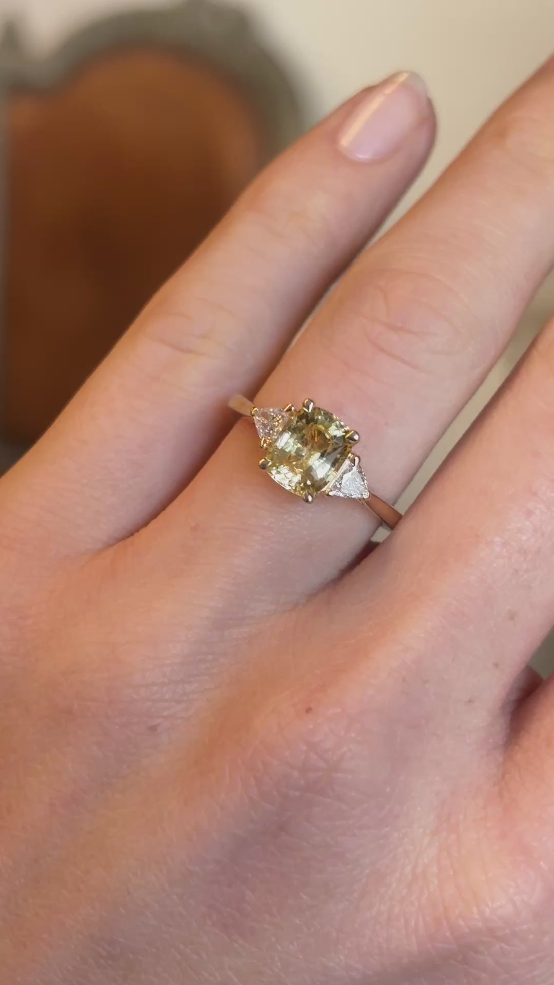 Yellow sapphire and diamond three-stone ring