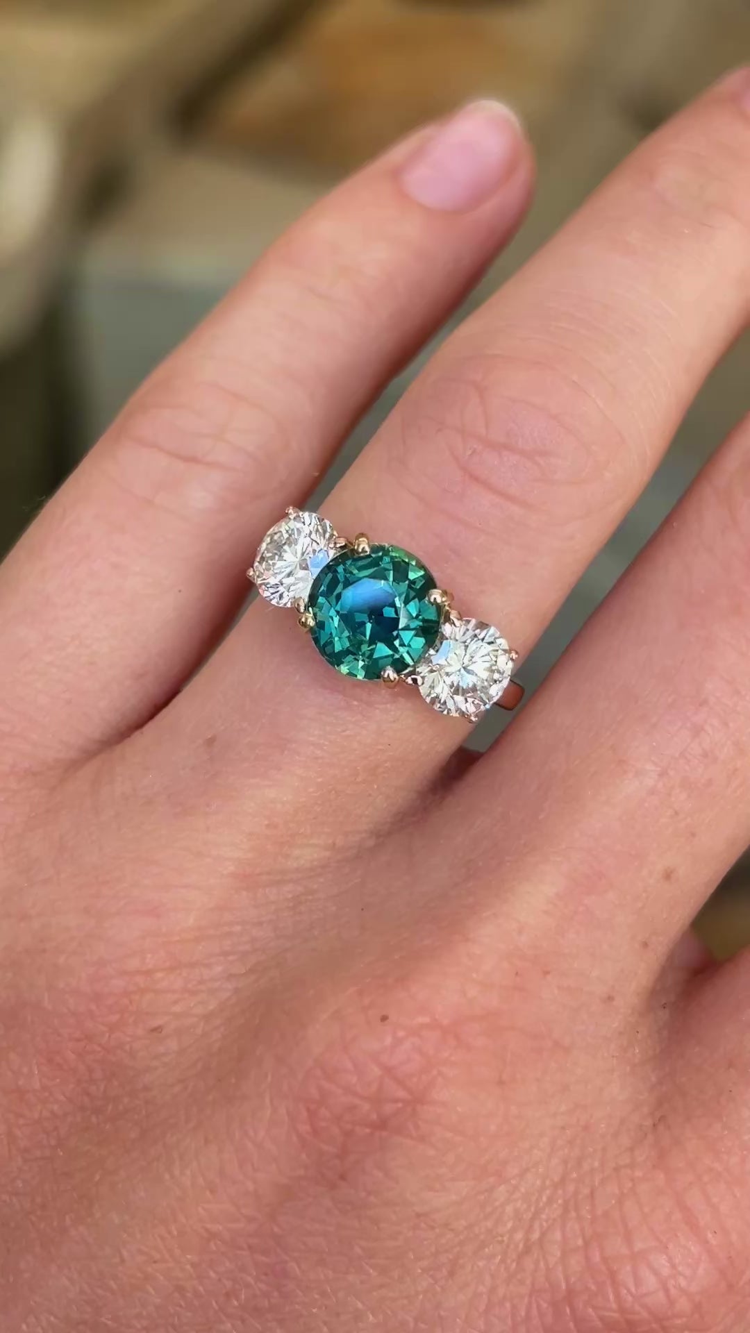 Vintage, teal sapphire and diamond three-stone engagement ring
