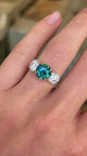 Vintage, teal sapphire and diamond three-stone engagement ring